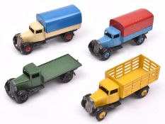4 Dinky Toys 25 series trucks. Type 3 Market Gardeners Lorry 25f in yellow, with yellow wheels. Plus