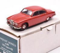 Conquest Models No.101 1967 Jaguar 420. In red with maroon interior, red wheels with plated hubcaps.
