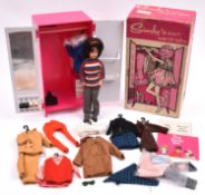 A Sindy by Pedigee Doll Ltd. An early doll in striped jumper and jeans. Together with a boxed