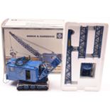 A German Menck & Hambrock Type M251 tracked shovel. A die-cast display model in blue with fixed blue