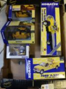 5 First Gear 1:34 and 1:50 scale 'Komatsu' liveried vehicles. Ford F650 with equipment hauler bed.