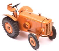 A rare 1950?s tinplate clockwork Renault tractor by CIJ Toys France. Finished in orange overall,