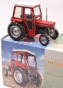 A Universal Hobbies 1:16 scale model of a Massey Fergusson 135 tractor (UH2697U). A very well