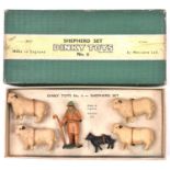 A Dinky Toys Shepherd Set (No.6). Comprising Shepherd, sheepdog and 4x sheep. Boxed, minor wear.
