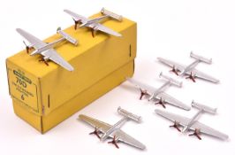 A Dinky Toys trade box of 70D Twin-Engined Fighter. Yellow box containing 6x Fighters in silver