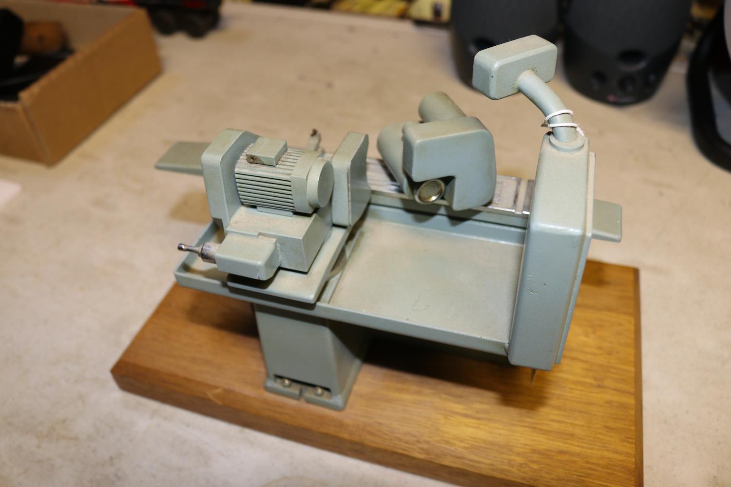 A small metal model of an industrial grinding machine. A well detailed model presented as a - Image 4 of 4