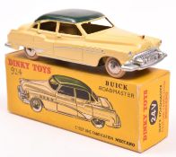French Dinky Toys Buick Roadmaster (24V). In yellow with a dark green roof, ridged spun wheels and