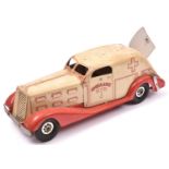 An American MARX 1930's Heavy Tinplate Clockwork Ambulance. In cream with red chassis and wings, red