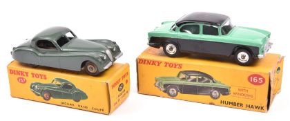 2 Dinky Toys. Jaguar XK120 Coupe (157). In dark sage green with fawn wheels with black tyres. Plus a