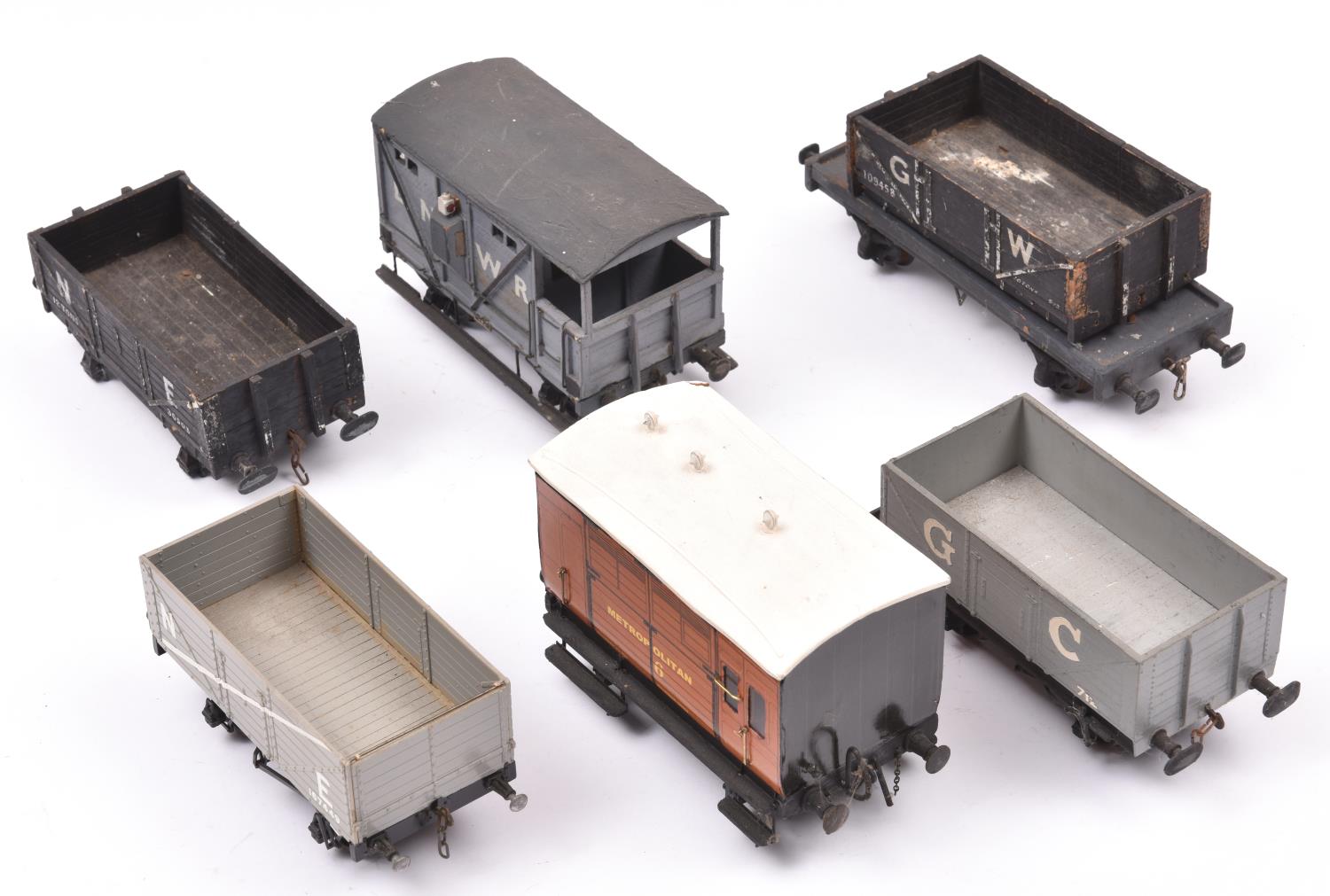 5x O gauge kit built/adapted freight wagons/vans. A Metropolitan Railway horsebox. An LNWR Guard's