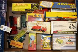 12 Dinky Toys. E.R.F. Fire Tender (266). Aveling Barford Centaur Dump Truck (924). Coles Hydra Truck