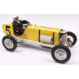 A tinplate and die-cast 'Miller' single seat racing Car. Designed in the U.K. by Gilbow, this