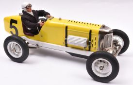 A tinplate and die-cast 'Miller' single seat racing Car. Designed in the U.K. by Gilbow, this