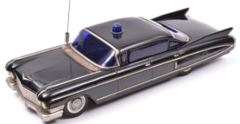 An impressively Large Yone (Y) Tinplate Battery Powered 1960 Cadillac Coupe DeVille. Finished in