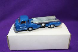 A Conrad 1:43 Mercedes-Benz Race Car Transporter, (Rennwagen). In blue with tan interior, '