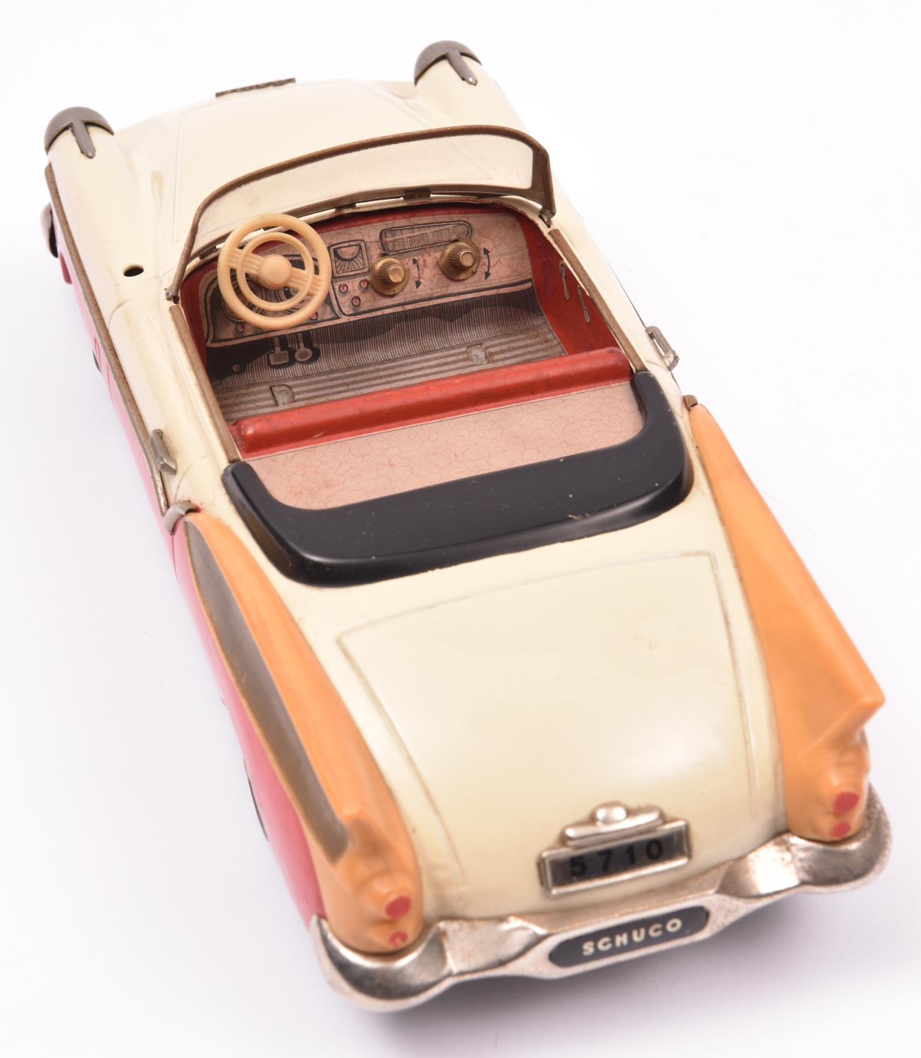 Schuco Tinplate 5710 Elektro-Radio2 door open top Packard style saloon. Finished in cream, red and - Image 3 of 4