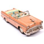 Bandai Friction Powered late 1950's Ford Fairlane 500 Sunliner. In pink with litho turquoise/red /