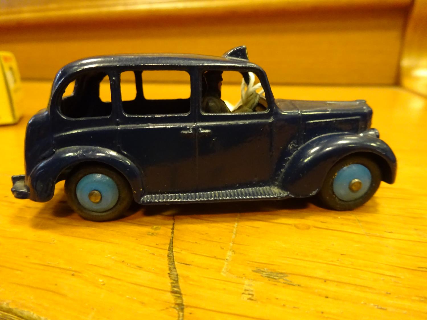 Dinky Toys Austin Taxi (254). A scarce example in dark blue with mid blue wheels and black tyres. - Image 4 of 5