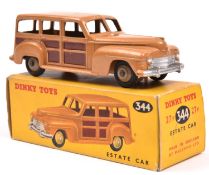 Dinky Toys Plymouth Estate Car (344/27F). In tan with dark brown panels and fawn wheels and black