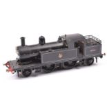 A finescale O gauge kitbuilt brass model of a BR 2-4-2T locomotive, 50746, in lined black livery.