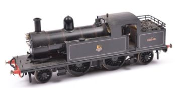 A finescale O gauge kitbuilt brass model of a BR 2-4-2T locomotive, 50746, in lined black livery.