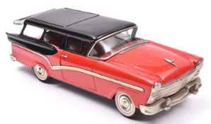 Bandai Friction Powered 1957 Ford Fairlane Station Wagon. In bright red with black roof and black