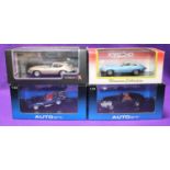 4 1:43 Sports Cars. 2x Autoart Jaguars- XKSS in dark metallic blue and a late Jaguar E Type V12 in