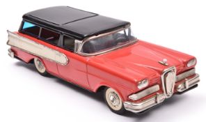 A late 1950's Japanese Haji Tinplate Friction Powered Ford Edsel Station Wagon. In red with black