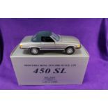 A CMC 1:18 scale Mercedes-Benz 450SL. A top up example in metallic silver with dark blue roof and