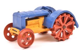 An early Dinky Toys 22e Tractor. An example in mid blue with yellow engine and red wheels.