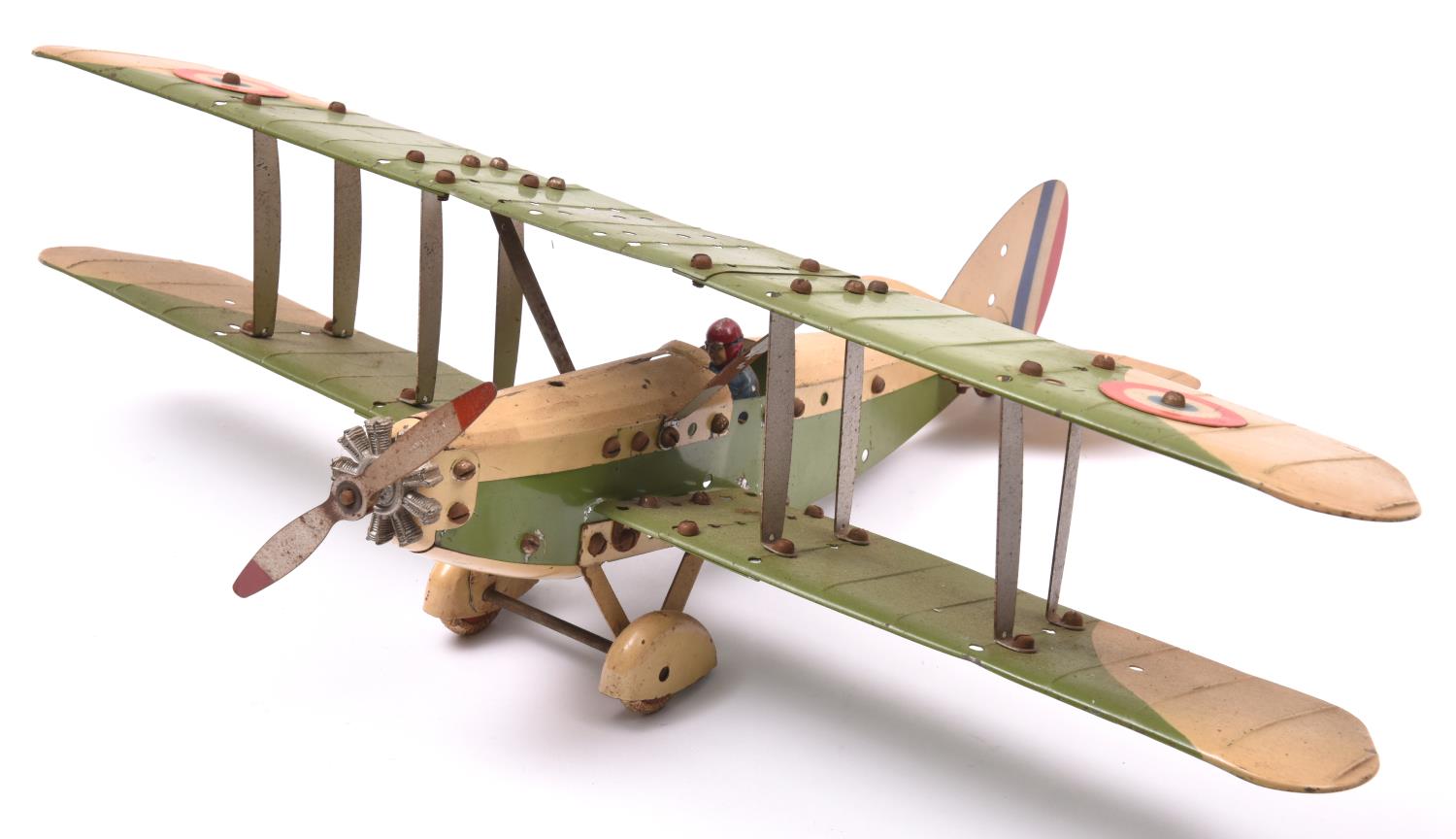 A Meccano Aero Constructor Tinplate Aircraft. Made up as a WW1 style Bi-Plane, finished in light