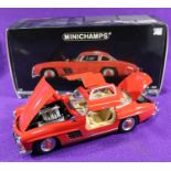 Minichamps 1:18 1954 Mercedes-Benz 300SL 'Gull Wing'. An example in bright red with a tan