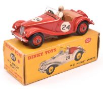 A Dinky Toys M.G. Midget Sports (102). Example in red with tan interior, RN24 and red wheels with