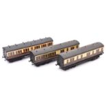 3x O gauge GWR compartment coaches marked LMC 1927 to ends. A Brake Third, Luggage van and Full