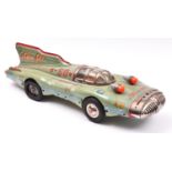 A rare late 1950's Japanese Yonezawa Tinplate Atom Jet Racer. A streamlined science-fiction style