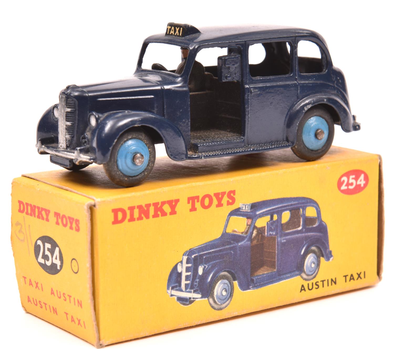 Dinky Toys Austin Taxi (254). A scarce example in dark blue with mid blue wheels and black tyres.