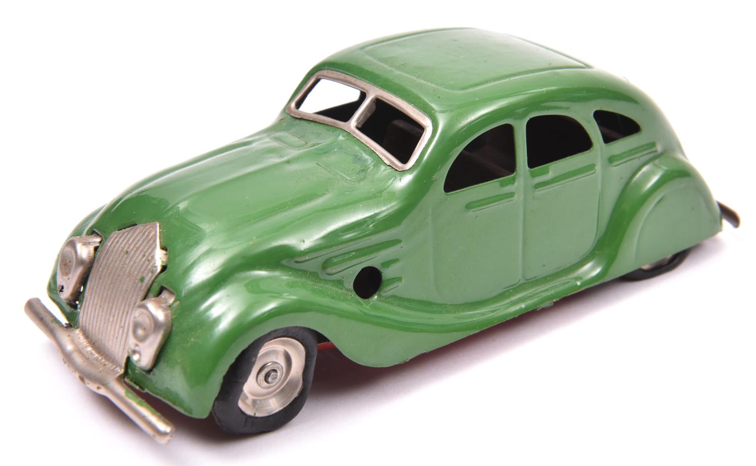 Tri-ang Minic Clockwork Tinplate Streamlined Saloon (Chrysler Airflow) 9M. An example in leaf
