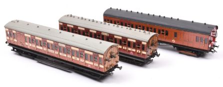 3x O gauge Metropolitan Railway suburban compartment coaches. 2x in teak and cream livery; a Full