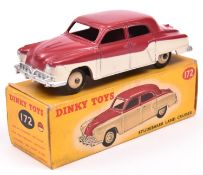 Dinky Toys Studebaker Land Cruiser (172). An low line example in cerise and cream with beige