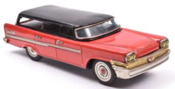 A Japanese T.N. (Nomura Toys) tinplate Friction Powered 1958 Chrysler New Yorker Station Wagon. In