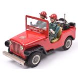 A Japanese T.N. (Nomura) Tinplate Battery Powered 'Fire Dept. No.1' Jeep. A mystery action toy,