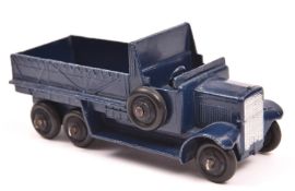 Dinky Toys Six Wheeled Transport Wagon 25s. An example in dark R.N. blue with black ridged wheels.