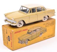 French Dinky Toys Opel Rekord (554). In ivory yellow with a cream roof, pale grey interior, dished