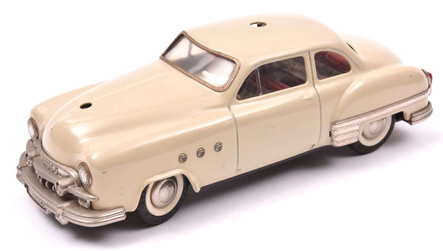 Schuco - Patient-Ingenico 5311 Tinplate 2 Door Saloon. A 1950's American style car in beige with a