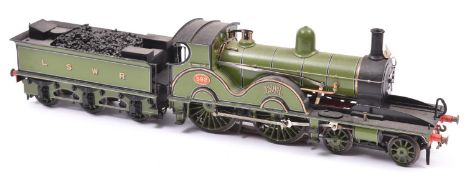 A finescale O gauge kitbuilt model of an LSWR Class X2 4-4-0 Adams tender locomotive, 592, in