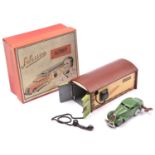 Schuco 15/200P tinplate set. Comprising a two door saloon in dark green, fitted with a clockwork