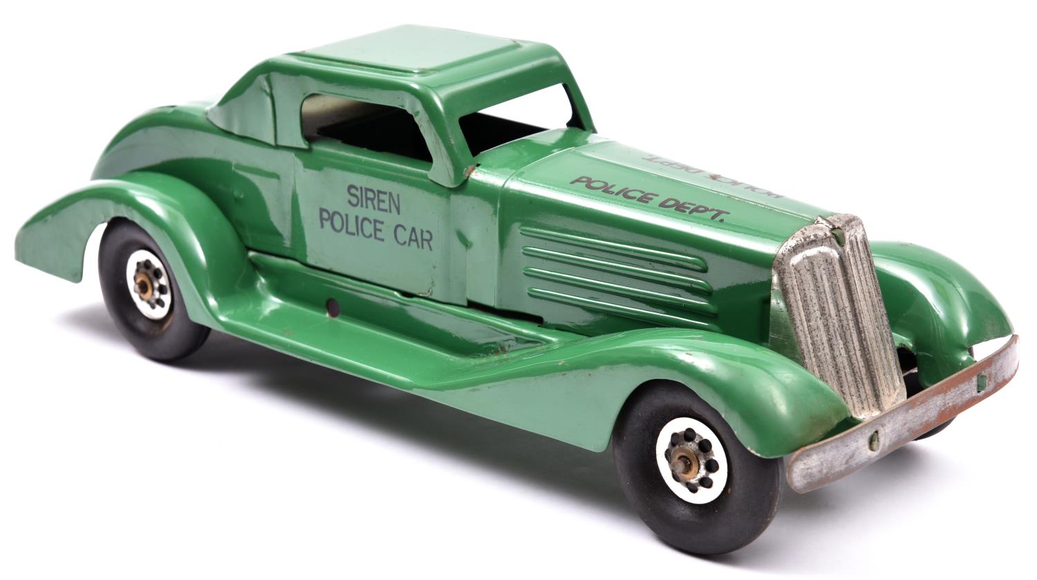 An American MARX 1930's Style Heavy Tinplate Siren POLICE Car. A friction powered example in dark