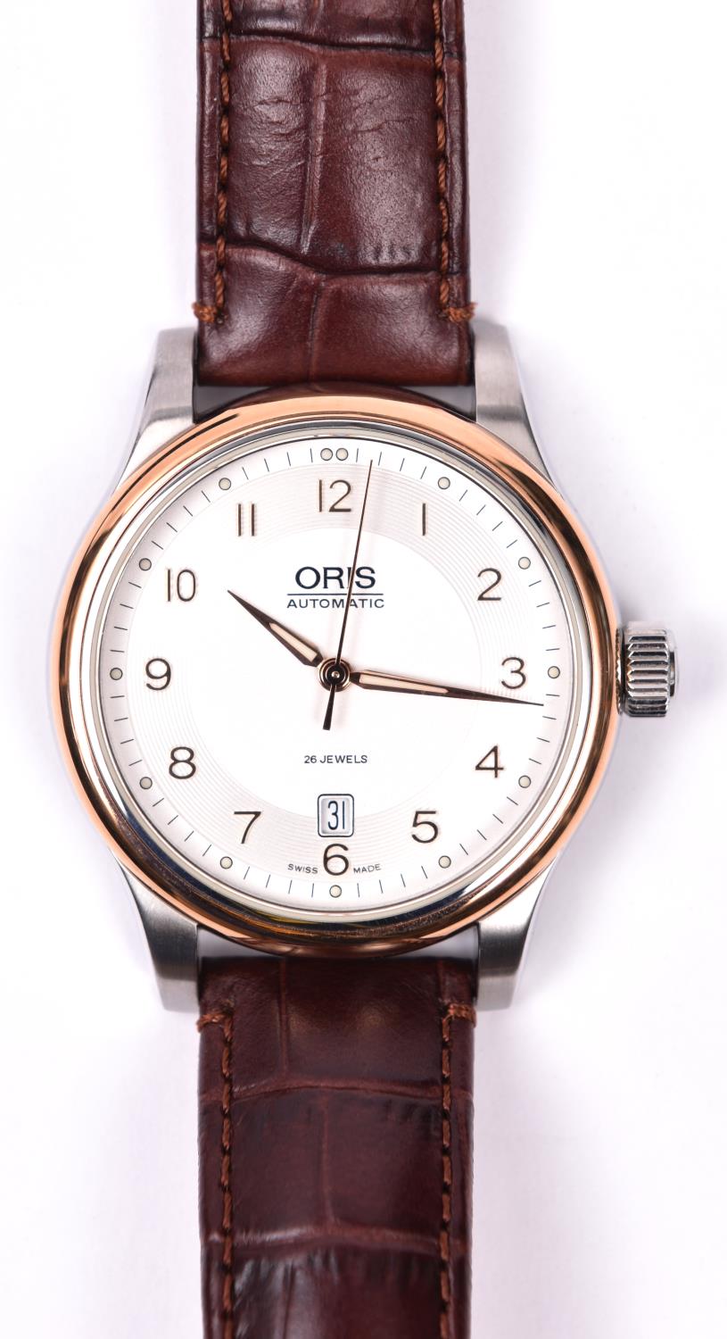 An Oris Classic Automatic watch with automatic self winding mechanism. With stainless steel case,