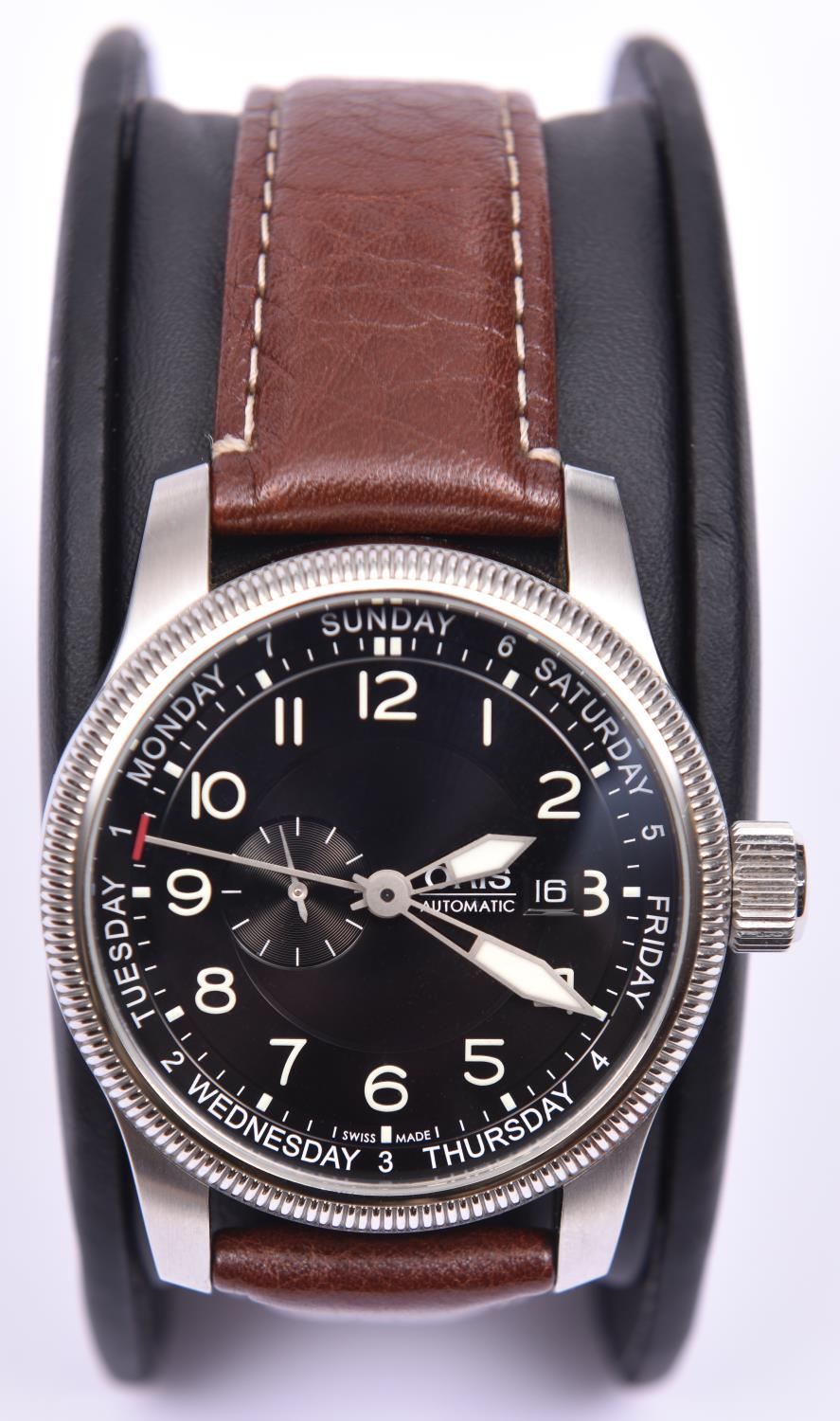 An Oris Automatic watch with automatic self winding mechanism. With stainless steel case, large