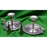 A pair of silver chamber candlesticks with large dish bases, carrying handles, snuffers and